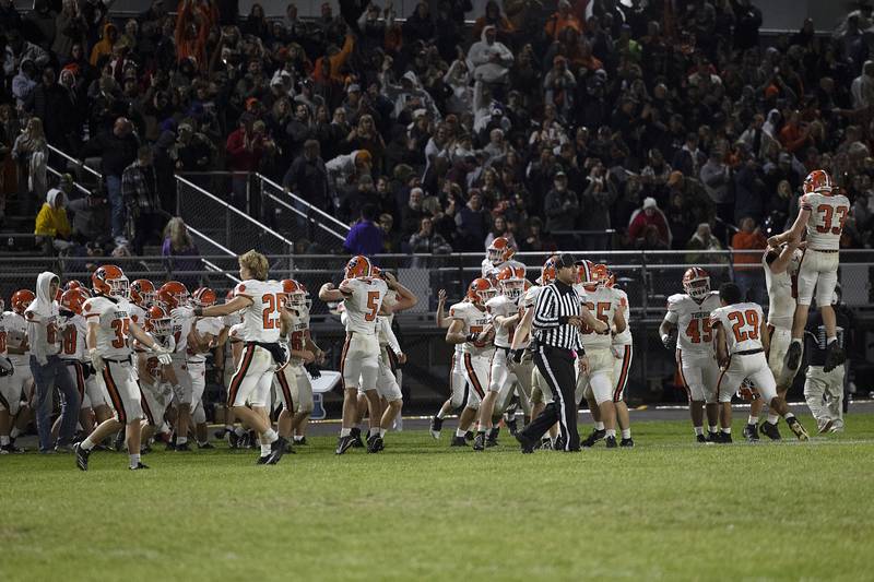 Byron celebrates their 29-28 win over the Dixon Dukes to take the Big Northern Conference championship Friday, Oct. 18, 2024, at A.C. Bowers Field in Dixon.