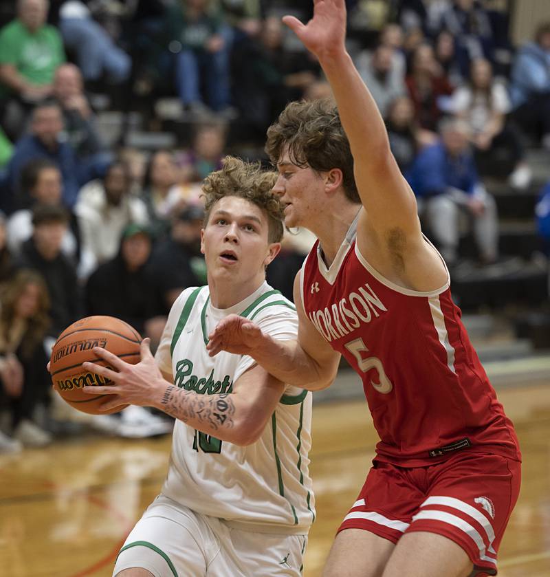 Rock Falls’ Kuitim Heald drives to the hoop against Morrison’s Chase Newman Wednesday, Feb. 21, 2024 at the Prophestown class 2A basketball regional.