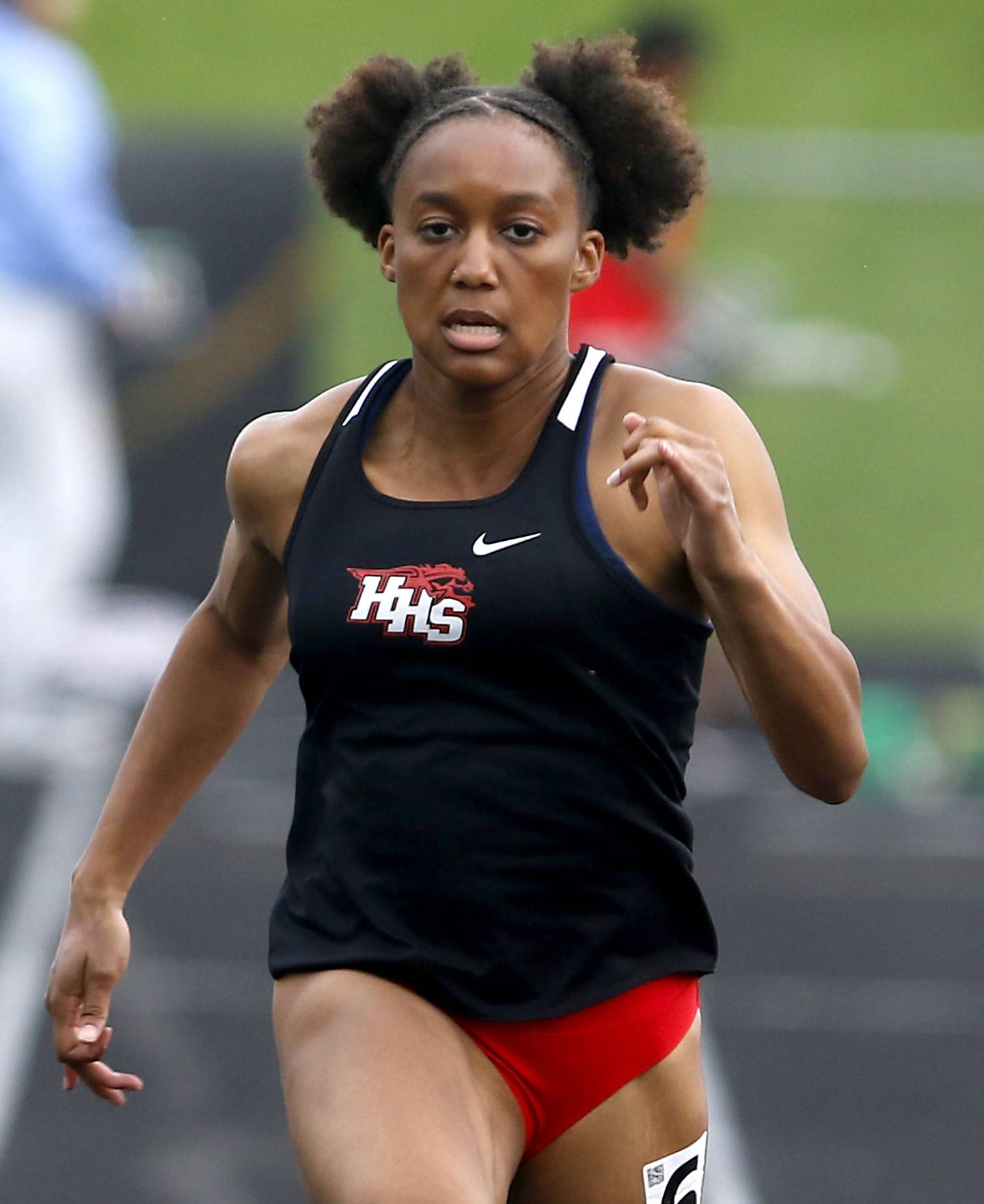 Huntley’s Dominique Johnson competes in the 100 meter dash on Thursday, May 2, 2024, during the Fox Valley Conference Girls Track and Field Meet at Jacobs High School in Algonquin.