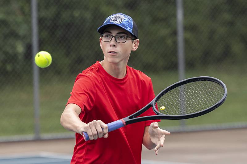 Gavin Staats plays the ball Wednesday, July 27, 2023 while playing mixed doubles in the Emma Hubbs Tennis Classic in Dixon.