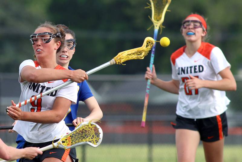 Crystal Lake Central’s Fiona Lemke moves the ball against  Lake Forest during girls lacrosse supersectional action at Metcalf Field on the campus of Crystal Lake Central Tuesday.