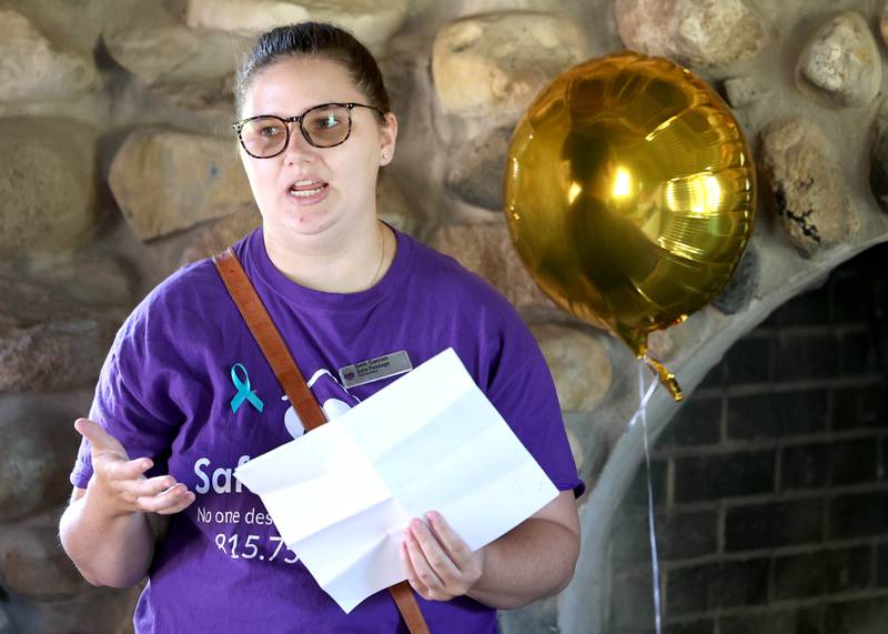 Beth Ganion, manager of prevention and communications for Safe Passage, speaks Friday, Sept 15, 2023, at the Sycamore Community Sports Complex during celebration of the life of Gracie Sasso-Cleveland on what would have been her sweet 16 birthday. Sasso-Cleveland, 15, was found dead May 7, 2023, in DeKalb. Timothy M. Doll, 29, of DeKalb, is charged with first-degree murder in her death.