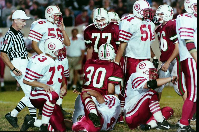 L-P and Ottawa play football in 1999. This was the 100th meeting between the two teams.