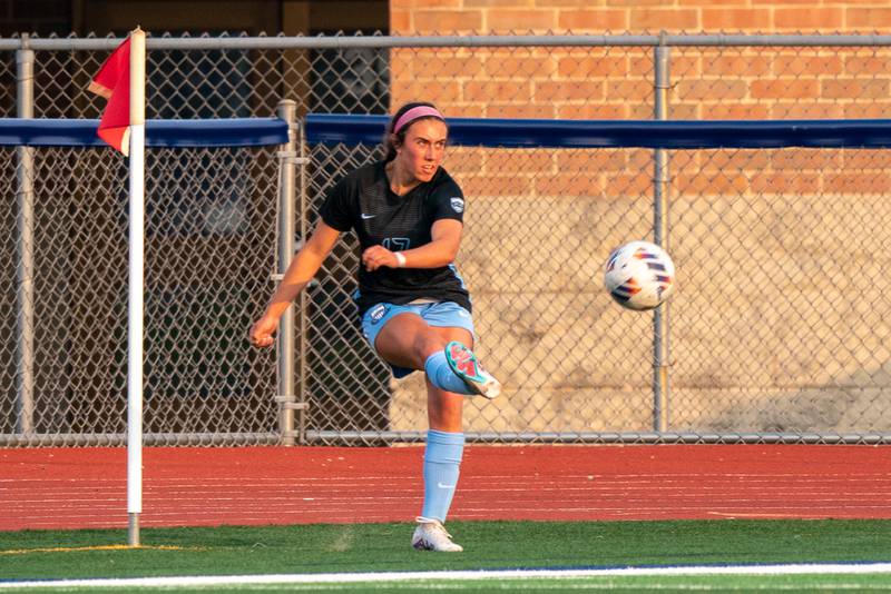 St. Charles North's Bella Najera (17) executes a corner kick for a goal against Wheaton Warrenville South during the Class 3A girls soccer regional final at St. Charles North High School on Friday, May 19, 2023.