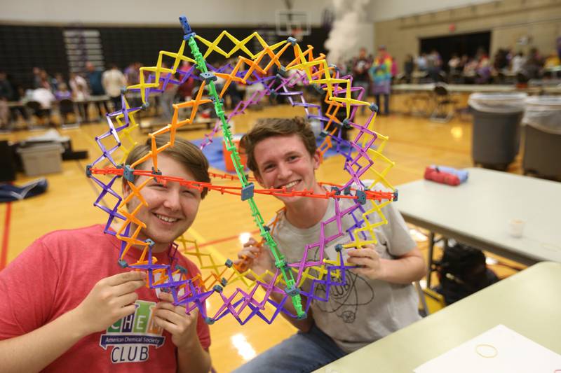 Ottawa High School Chem Club students Totus Keely and Carter Snook pose for a photo with a fun sphere during the annual Scifest on Friday, April 21, at Illinois Valley Community College  in Oglesby.