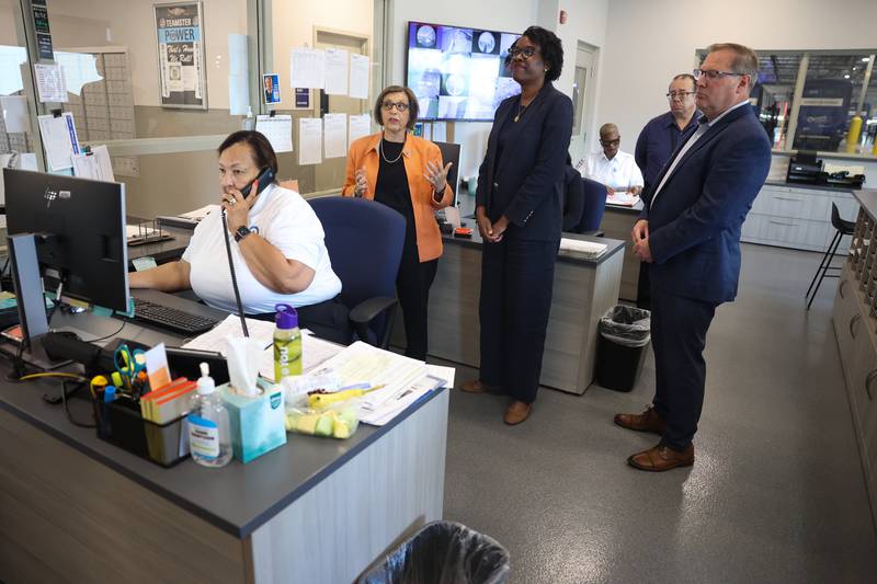 Pace Executive Director Melinda Metzger, center left, gives State Representative Lauren Underwood a tour at Pace’s bus depot on Monday July 1, 2024 in Plainfield.