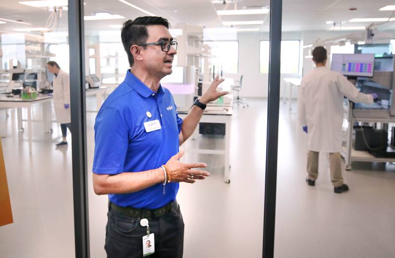 Andres Gutierrez, global functional head of research and development in genotyping and molecular applications at Syngenta, talks about the lab Friday, June 23, 2023, during the grand opening of the Syngenta Seeds Research and Development Innovation Center in Malta.