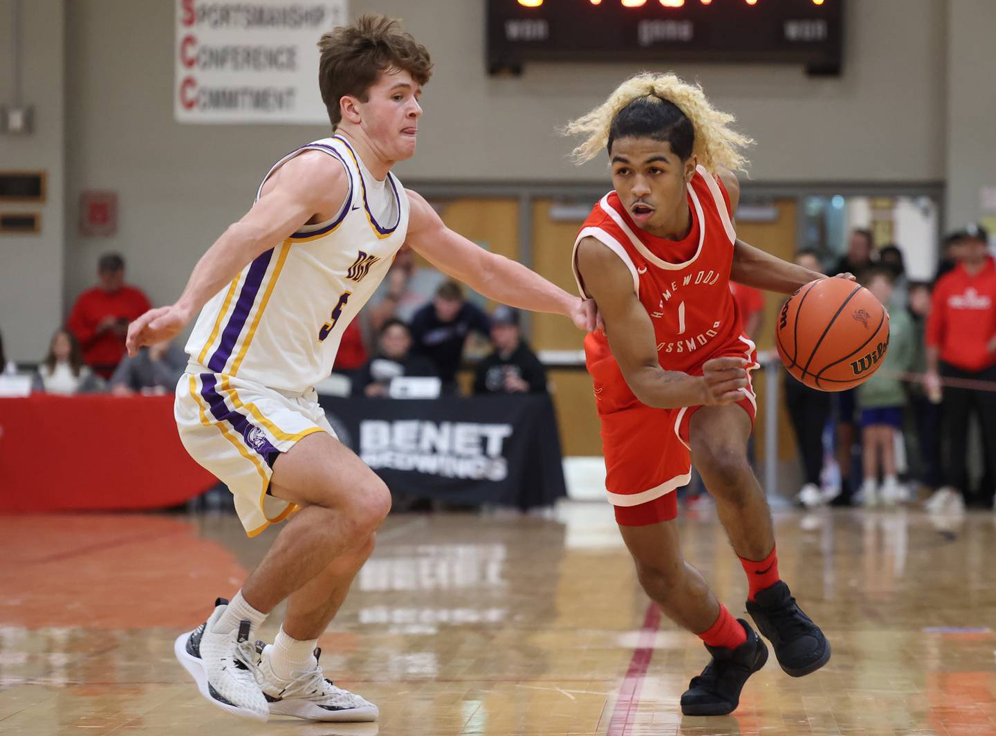 Downers Grove North’s Owen Thulin (5) defends against Homewood-Flossmoor’s Gianni Cobb (1) during the When Sides Collide Shootout on Saturday, Jan. 20, 2024 in Lisle, IL.