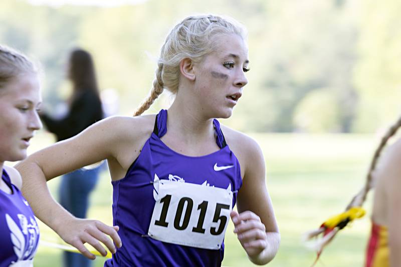 Dixon’s Emma Smith makes one of the turns on the course during the Rock River Run Saturday, Sept. 23, 2023 at Hoover Park in Sterling.