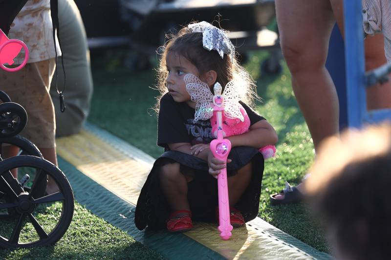 Ariana Imparato watches 7th Heaven perform at the Taste of Joliet on Friday, June 21, 2024 at Joliet Memorial Stadium.