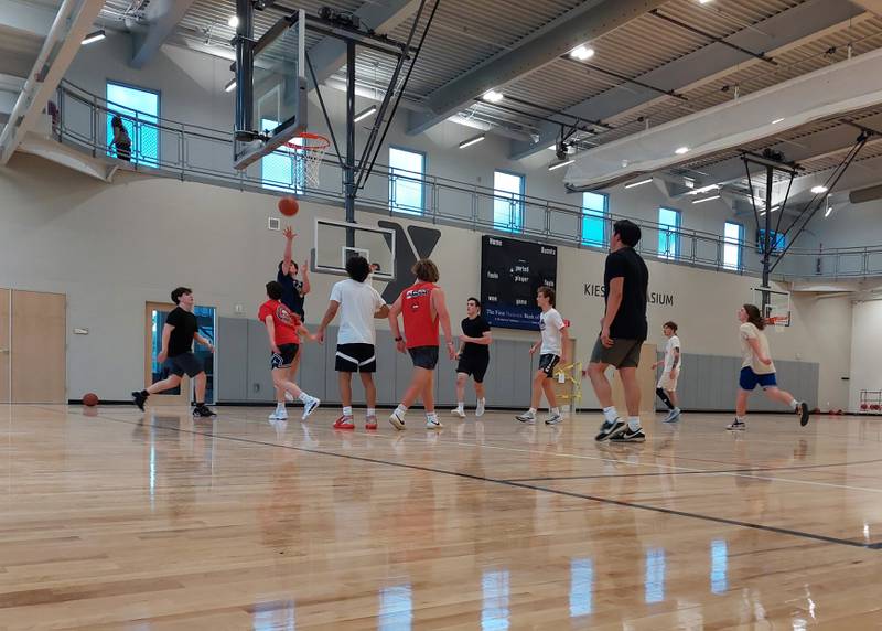 Basketball players took part in a full court pickup game Monday, May 13, 2024, on the opening day of the YMCA being open to the public in the new gymnasium.