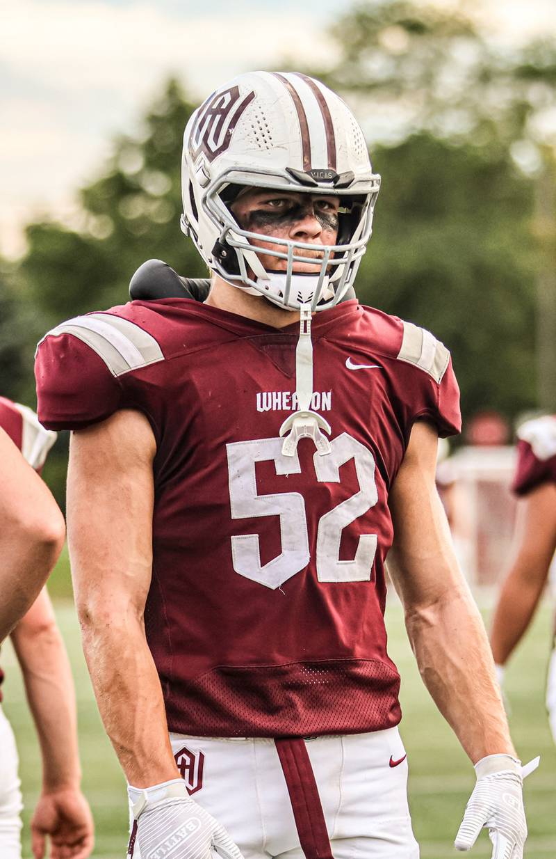 Jeremy Johanik, a two-way starter at center and defensive end, is a key cog in the Warriors’ quest to make another long playoff run this season. He is the third Johanik brother to play for Wheaton Academy.