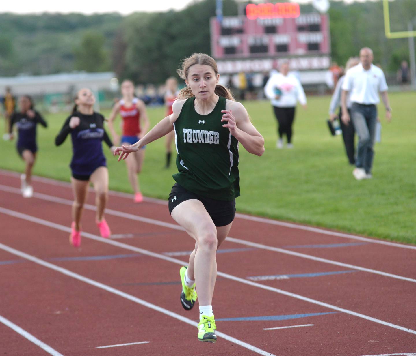 West Carroll's Emma Randecker heads to the finish line in the 200 meters at the 1A Oregon Sectional on Friday. May 10, 2024. Randecker won 100, 200, and 400 and qualified for the state finals at Eastern Illinois University in Charleston.