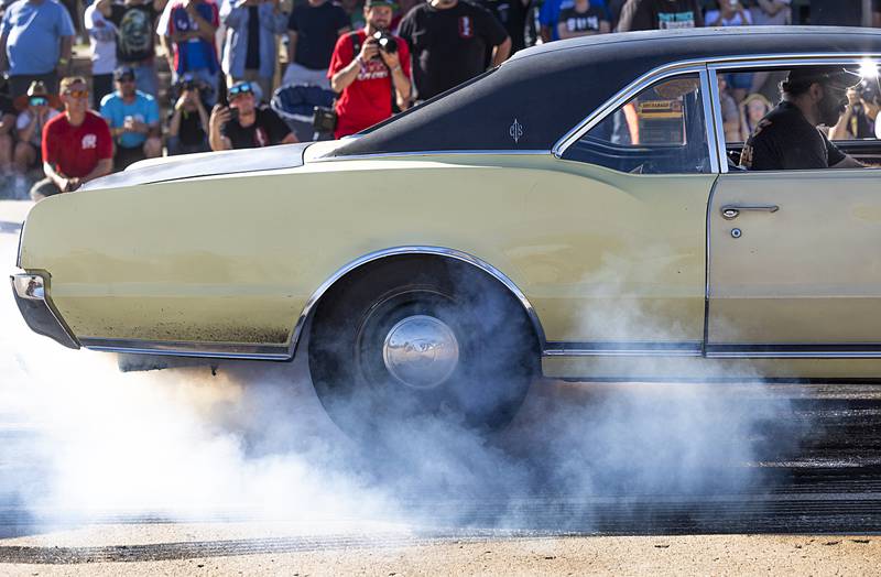 Rajveer Ahuja thrills the crowd with a 30-second rubber-burning display during the burnout show Monday, June 10, 2024, in Rock Falls.