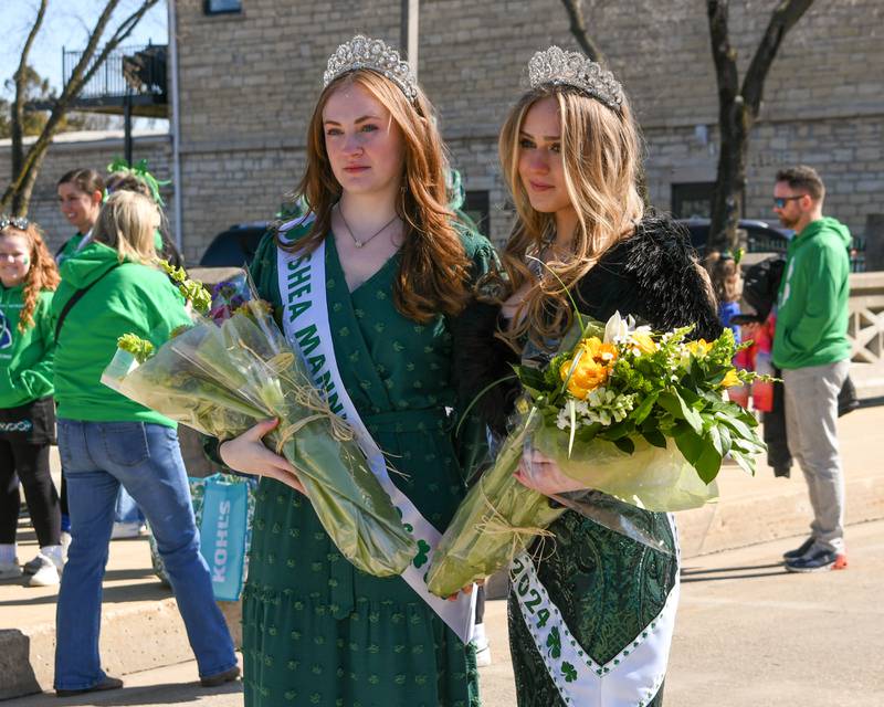 Shea Manning, left, the 2023 St. Patrick’s Day Queen and Brayah Bromberek the 2024 St. Patrick’s Day Queen pose for a photo before the start of the St. Patrick’s parade in downtown Lemont on Saturday March 8, 2024.