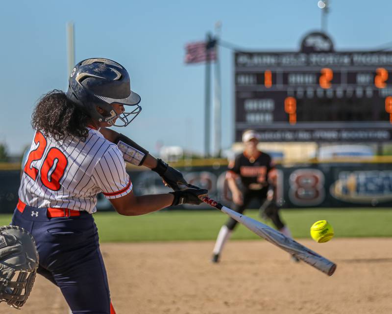 Oswego's Jaelynn Anthony (20) connects on a pitch for a homerun during Class 4A Plainfield North Sectional semifinal softball game between Wheaton-Warrenville South at Oswego. May 29th, 2024.