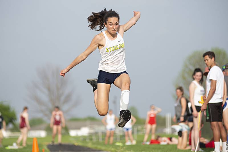 Sterling's Alice Sotelo focuses during the triple jump to qualify for state at the 2A track sectionals in Geneseo on Wednesday, May 11, 2022.