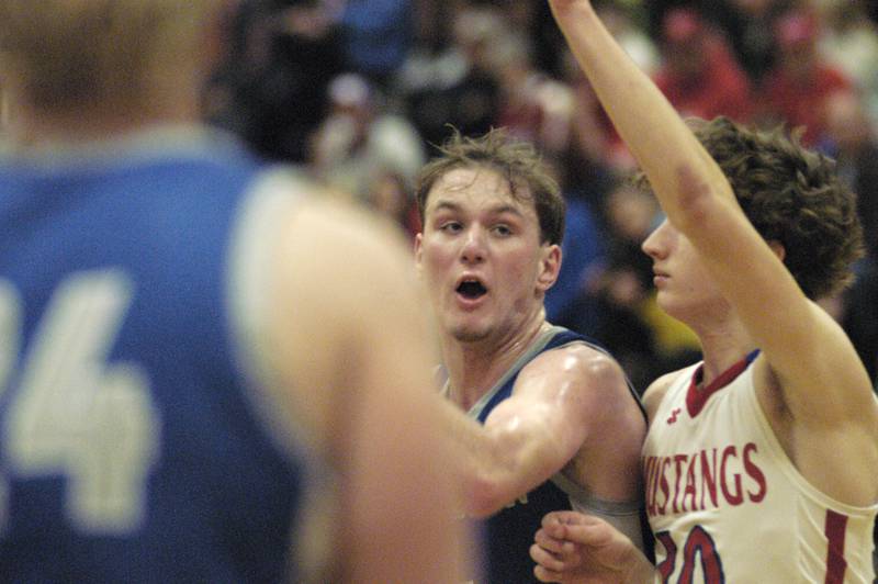 Princeton's Korte Lawson heads to traffic being defended by Morrison's Colton Bielema during the Morrison vs Princeton class 2A basketball regional final at
Prophetstown High School on Friday, Feb. 23 .