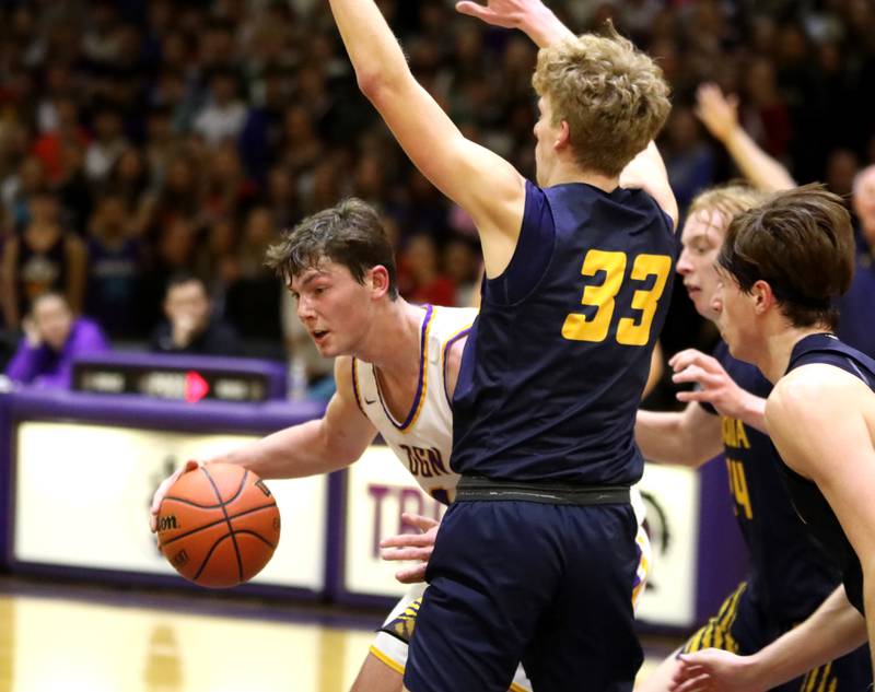 Downers Grove North’s Jake Riemer tries to get around Neuqua Valley’s Joe Balgro during the Class 4A Downers Grove North Regional final on Friday, Feb. 23, 2024.