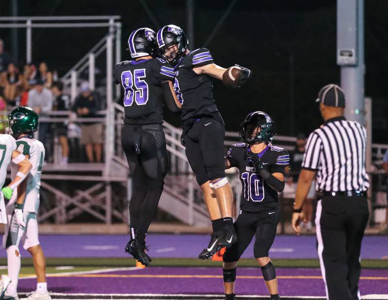 Downers Grove North's Joe (8) celebrates a touchdown reception during a football game between Glenbard West at Downers Grove North on Friday, Sept 13th, 2024  in Downers Grove.