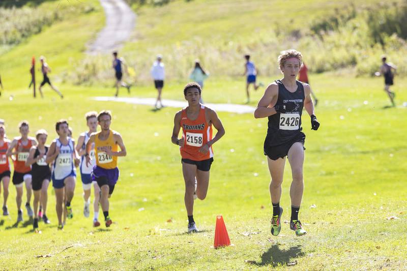 Erie-Prophetstown’s Charlie Link leads a group in the 50th Amboy Columbus Day Cross Country Invite Monday, Oct. 9, 2023. Link took 6th.