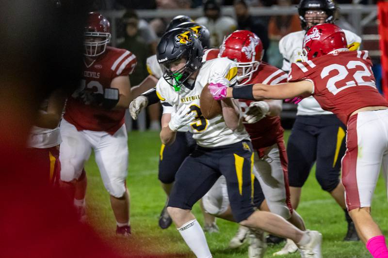 Caen Beckett of Riverdale attempts to run ball whilst being tackled on Friday, October 18, 2024 at Richard Nesti Stadium in Spring Valley.