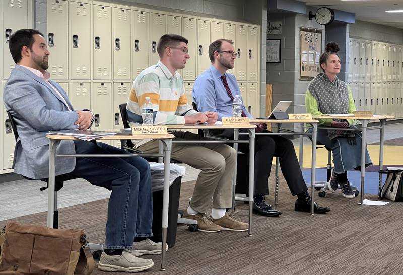 Sycamore Community School District 427 Board of Education Vice President Michael DeVito II sits next to new board member Alex Grados, James Chyllo and fellow rookie board member, Beth Marie Evans on Tuesday, April 25, 2023.