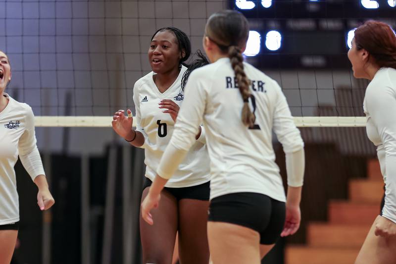 Plano's Lamiya House (6) celebrates the win with her teammates during volleyball match between Sandwich at Plano.  August 21, 2023.