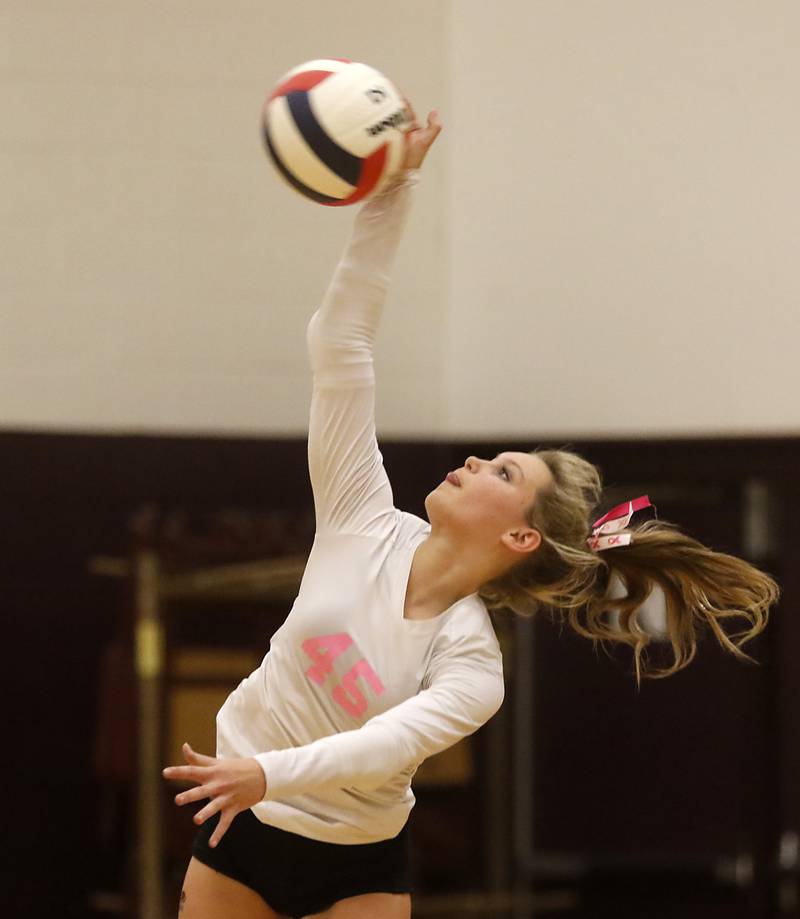 Richmond-Burton's Lanee Cooley serves the ball during a Kishwaukee River Conference volleyball match against Woodstock North Wednesday, Oct.11, 2023, at Richmond-Burton Community High School.