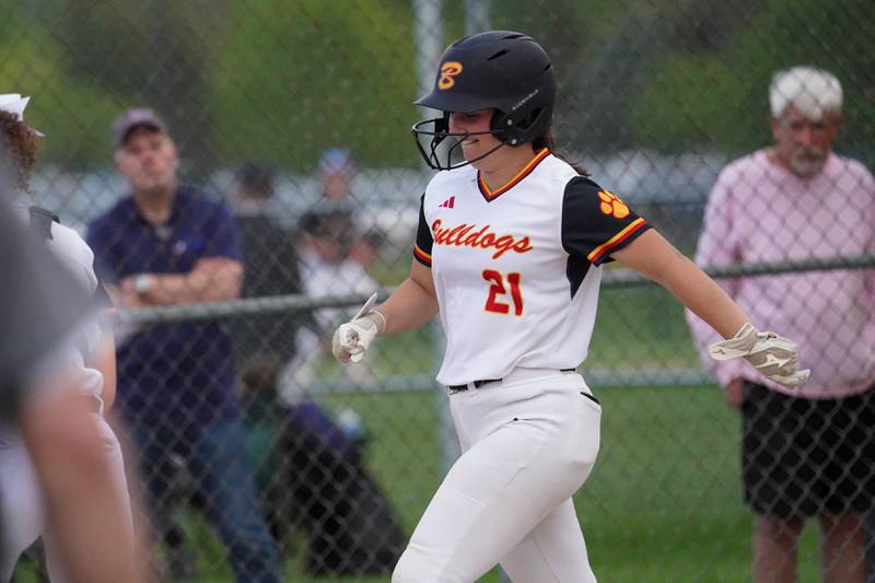 Batavia’s Bella Zagotta (21) smiles as she heads for home after hitting a homer against Geneva during a softball game at Batavia High School on Wednesday, May 8, 2024.