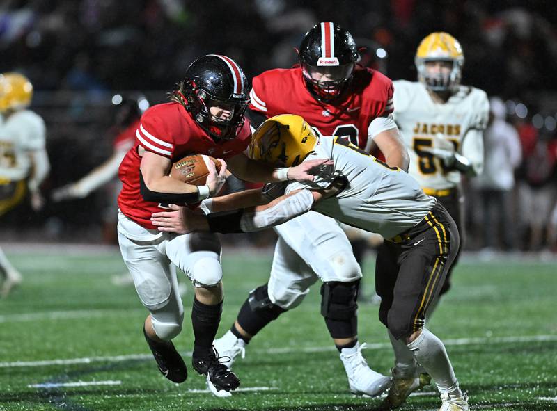 Lincoln-Way Central's Tyler Tulk runs the ball during the class 7A first round  playoff game against Jacob on Friday, Oct. 27, 2023, at New Lenox. (Dean Reid for Shaw Local News Network)
