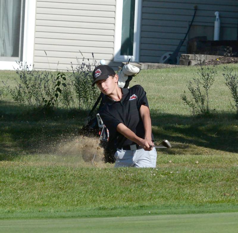 Fulton's Owen Van Zuiden hits out of a sand trap at the 1A Lanark Regional at Lake Carroll Golf Course on Wednesday, Oct. 2, 2024.