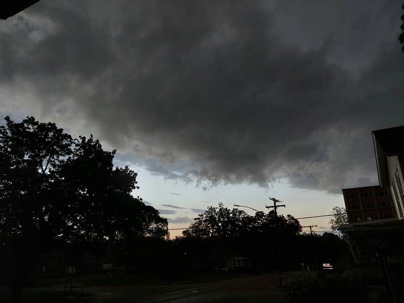 Dark storm clouds move across OSF Center for Health Streator as a severe thunderstorm warning has been issued.