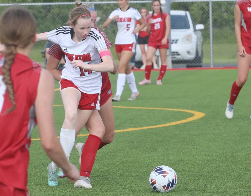 Streator's Bridget McGurk looks to advance the ball forward as Morton defenders swarm in during the Class 2A Regional semifinal game on Wednesday, May 15, 2024 at the L-P Athletic Complex in La Salle.