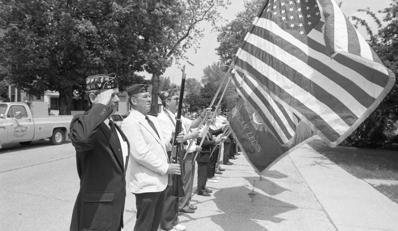 DeKalb American Legion Post 66 members at Barb City Manor in DeKalb for Memorial Day ceremonies in 1989.
