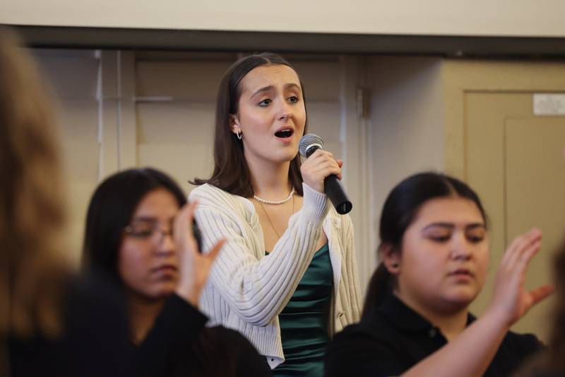 Joliet West student Payton Fraser sings the National Anthem at the Joliet Township High School’s annual Salute To Service Partnership Recognition dinner on Tuesday, April 9, 2024 in Joliet.