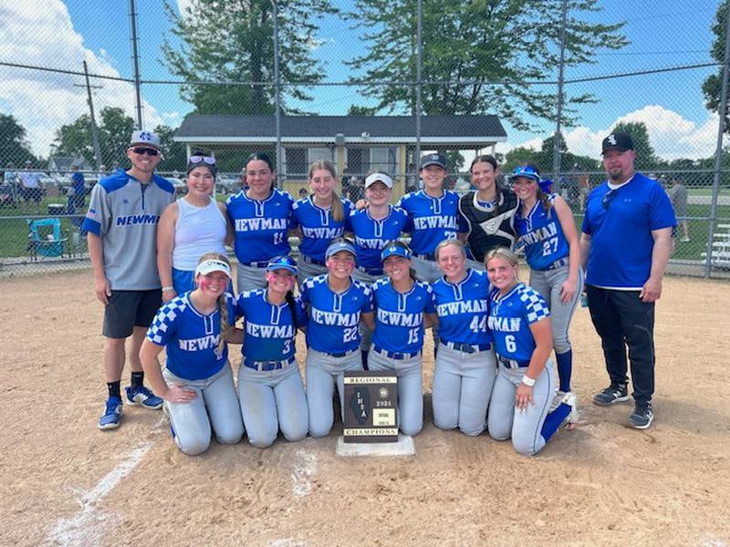 The Newman softball team poses with their regional plaque after beating Putnam  County in the Class 1A Putnam County Regional final.