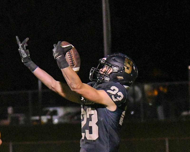 Sycamore Dylan Hodges (23) celebrates after getting a touchdown in the second quarter against Evergreen Park on Friday Oct. 27, 2023, during the first week of play offs held at Sycamore High School.