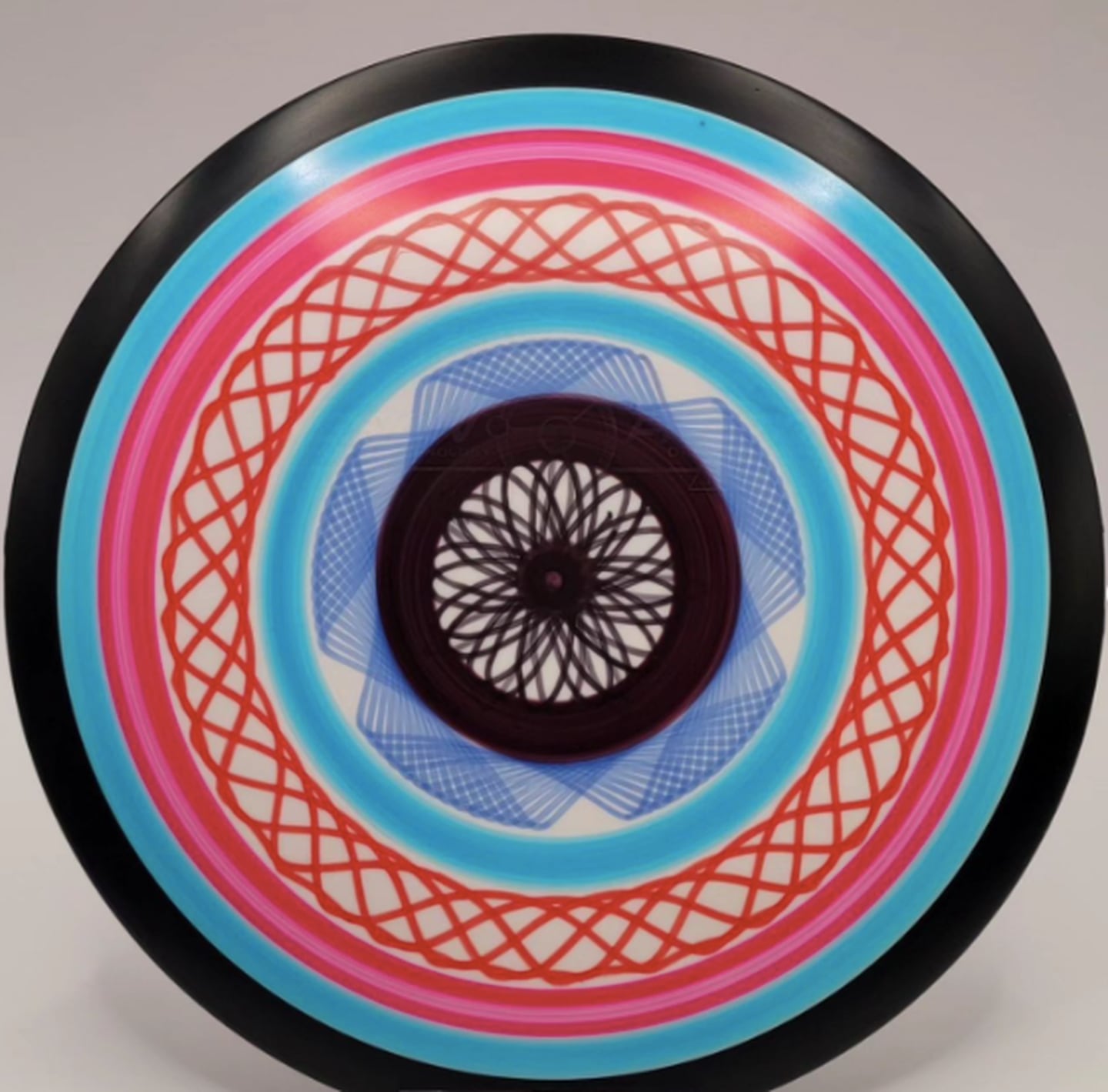 A disc Mike Muggli created featuring his intricate stencil work.