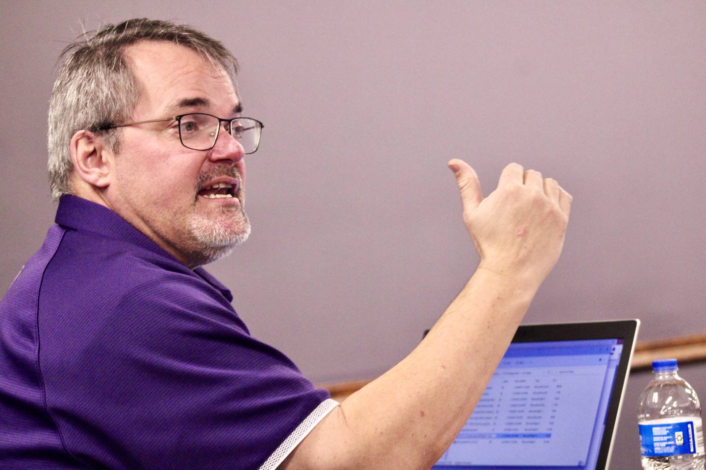 Business manager Marc Campbell gestures while in discussion with Superintendent Margo Empen prior to the start of the Dixon Public Schools board of education meeting on Wednesday, Dec. 15, 2022.