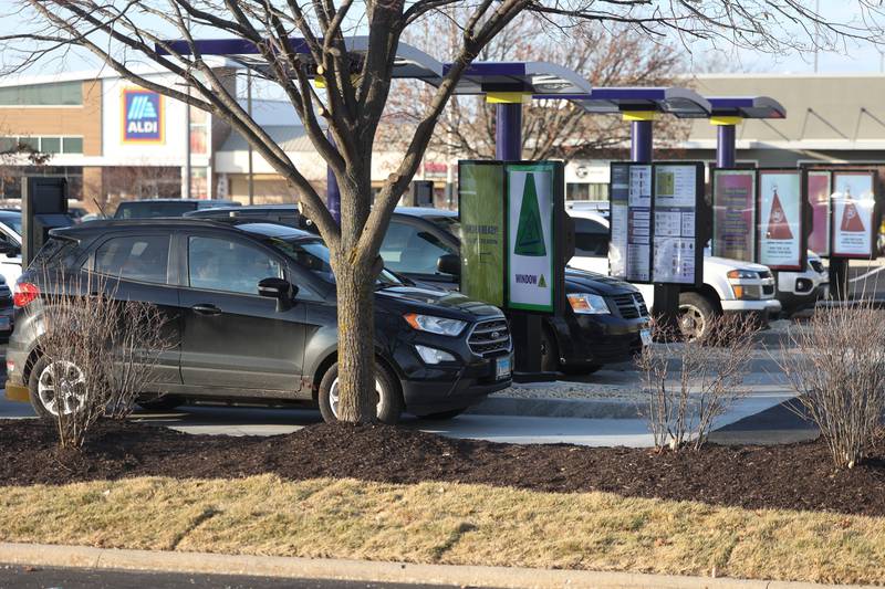 Customers place their orders at CosMc’s, McDonald’s first small format beverage driven concept drive-thru restaurant, on Friday, Dec. 8, 2023, in Bolingbrook.
