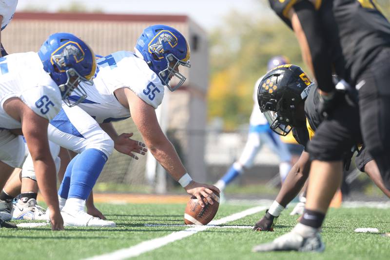 Joliet Central’s Harrison Majerus waits to snap the ball against Joliet West on Saturday, Sept. 23, 2023 in Joliet.