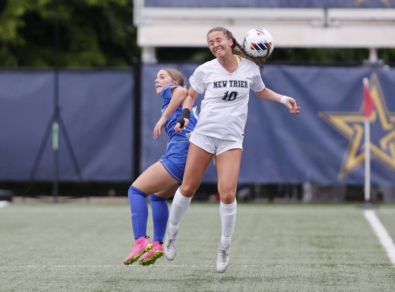 New Trier's Annie Paden (10) heads the ball during the Class 3A Dominican super-sectional between New Trier and Lyons Township in River Forest on Tuesday, May 28, 2024.