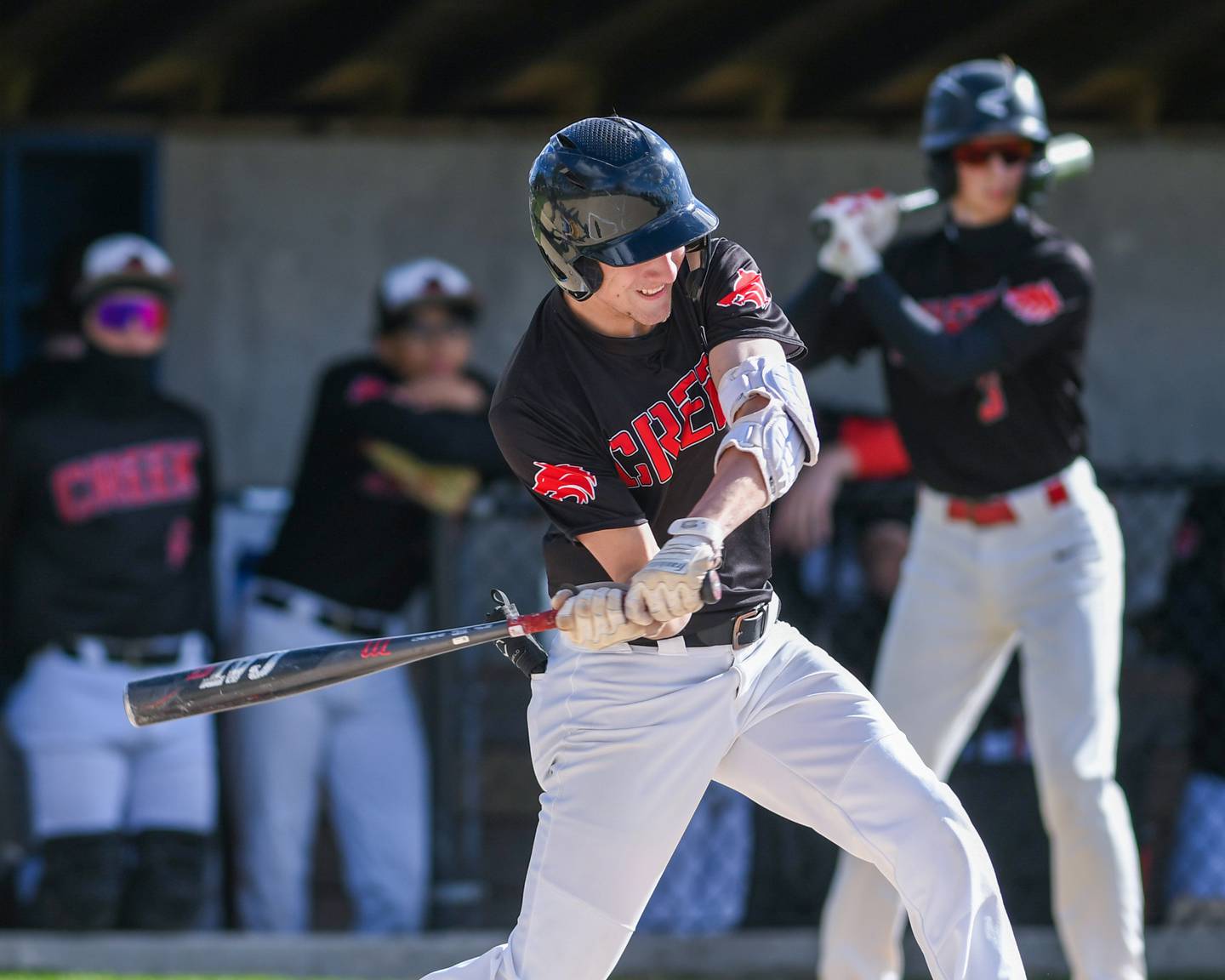 Indian Creek's Jeffrey Probst (11) gets a base hit while taking on Hiawatha on Friday April 12, 2024, at Hiawatha High School.