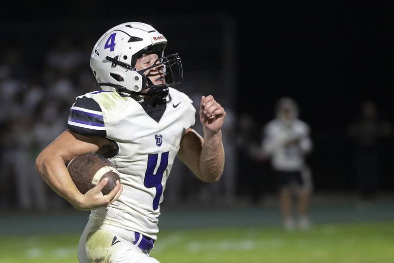 Dixon’s Landon Knigge heads for the end zone against Rock Falls Friday, Sept. 13, 2024, at Hinders Field in Rock Falls.