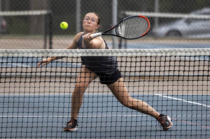 Rachel Lance returns a ball Wednesday, July 27, 2023 while playing mixed doubles in the Emma Hubbs Tennis Classic in Dixon.