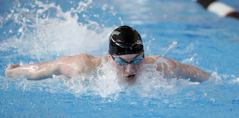 Aiden Musick, of New Trier competes in the Boys 100 Yard Butterfly during the IHSA Boys state swim finals Saturday February 25, 2023 in Westmont.