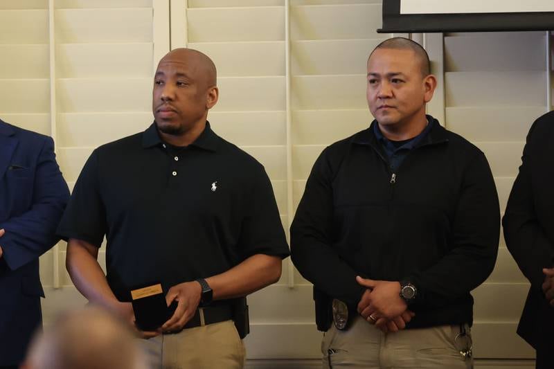 School Resource Officers, Detective Jamere Price, left, and Detective Josh Battung were awarded the 2024 Superintendent's Medallion along with the Joliet Police Department at the Joliet Township High School’s annual Salute To Service Partnership Recognition dinner on Tuesday, April 9, 2024 in Joliet.