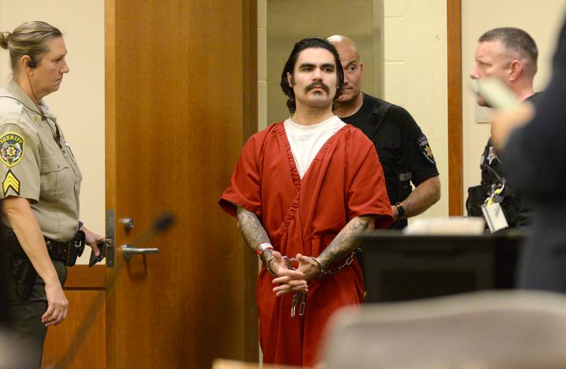 Jonathon Gounaris is escorted into an Ogle County courtroom on Monday, Sept. 16, 2024. He is being held in the Winnebago County Jail for attempted murder stemming from a June incident where three police officers were shot.