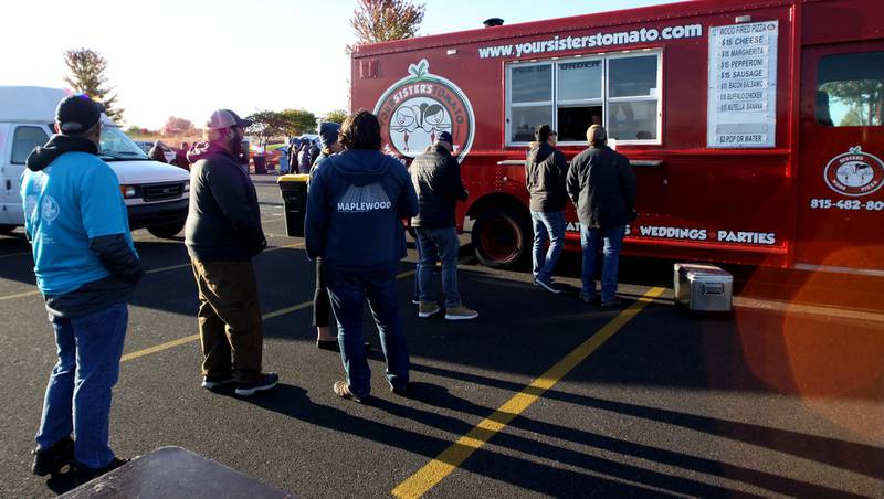 Diners line up for food at Your Sister’s Tomato food truck during the Pub in the Park Craft Beer and Food Truck Festival on Saturday, Oct. 15, 2022, at Lake in the Hills’ Sunset Park.